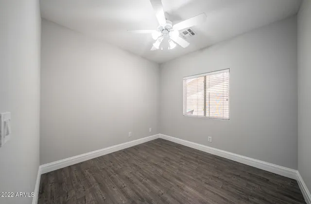 a bathroom with a sink toilet a mirror and shower