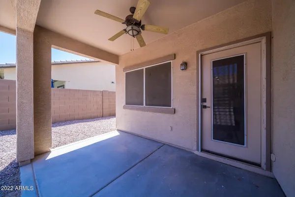 a view of swimming pool with outdoor seating