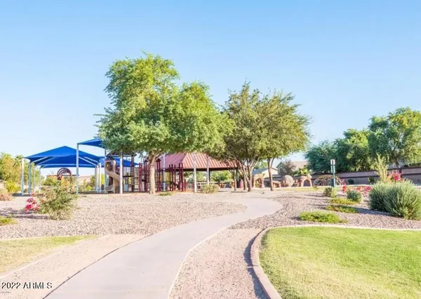 a sign that is sitting on a wooden floor