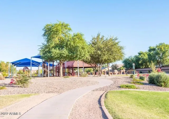 a sign that is sitting on a wooden floor