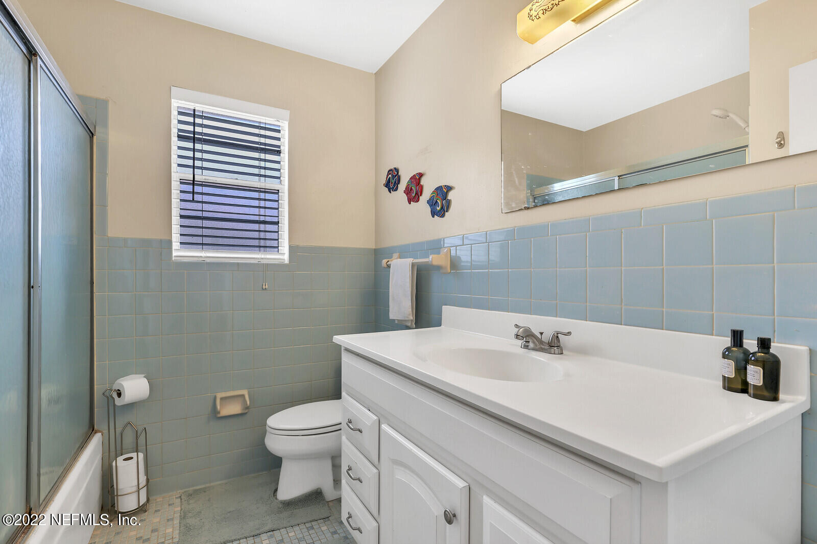 13 Sailfish Drive Ponte Vedra Beach, FL 32082 - Photo 12 of 34 a bathroom with a sink a toilet and mirror