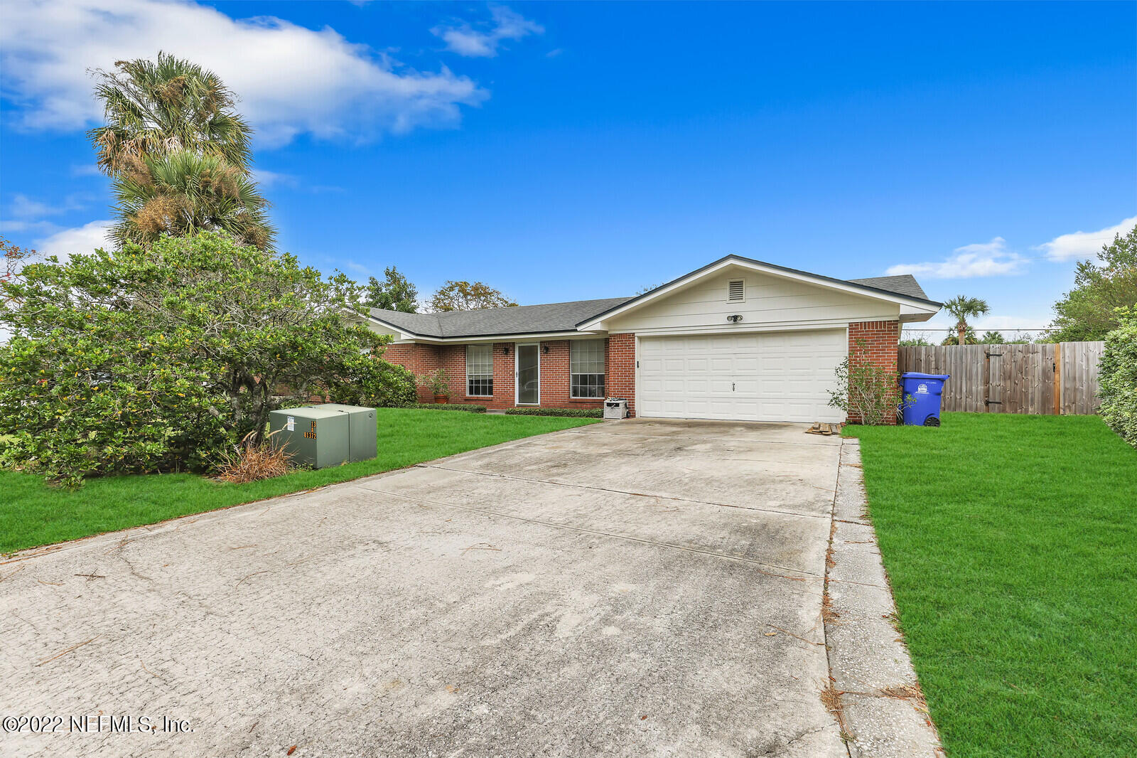 13 Sailfish Drive Ponte Vedra Beach, FL 32082 - Photo 33 of 34 a front view of a house with a yard and garage
