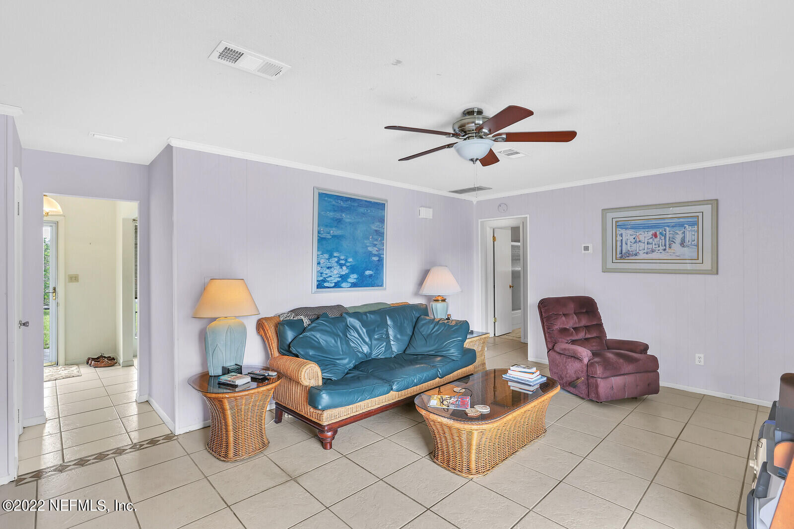 13 Sailfish Drive Ponte Vedra Beach, FL 32082 - Photo 4 of 34 a living room with furniture a rug and a chandelier