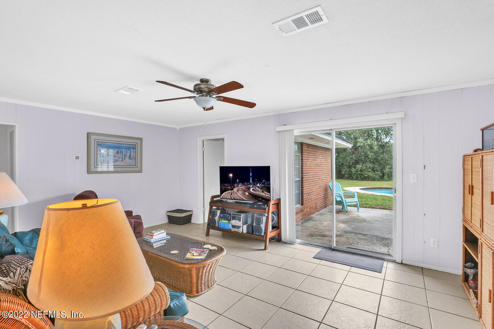 13 Sailfish Drive Ponte Vedra Beach, FL 32082 - Photo 5 of 34 a living room with furniture and a flat screen tv