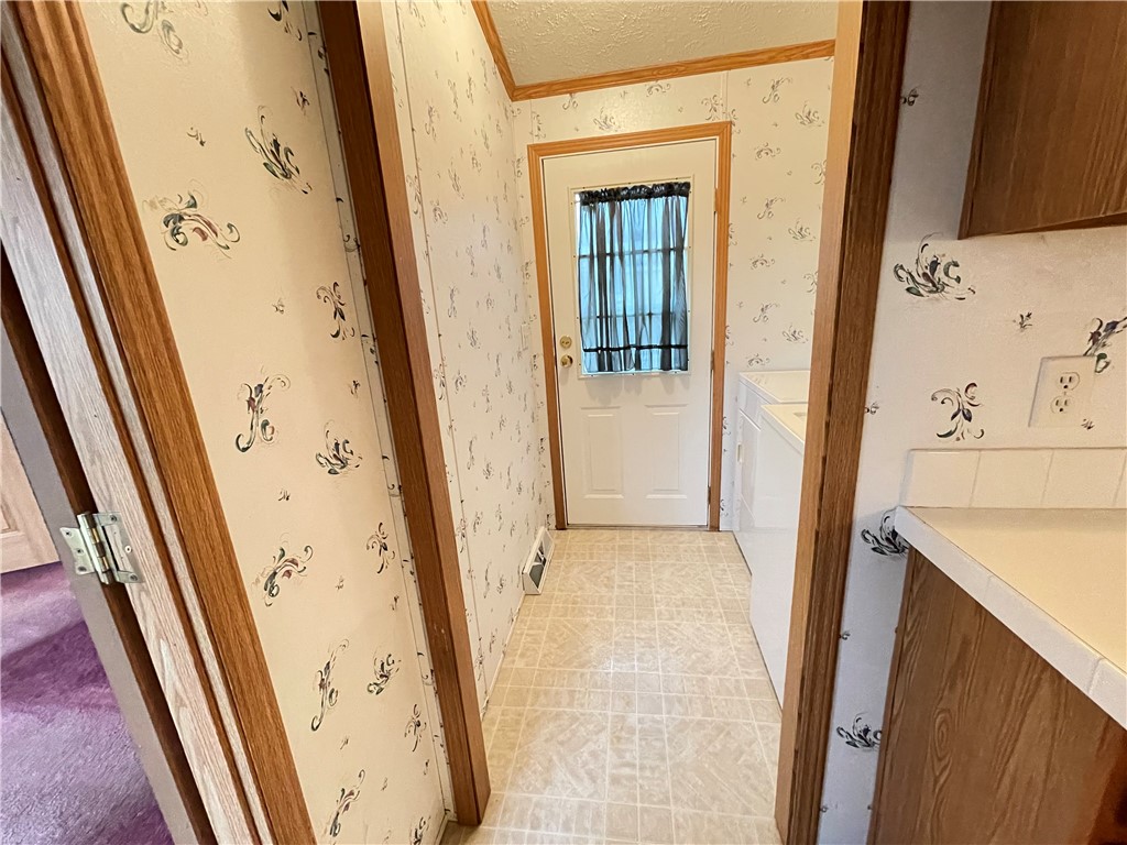 404 Tailrace Lane Mount Morris, NY 14510 - Photo 18 of 31 Laundry room egress door.