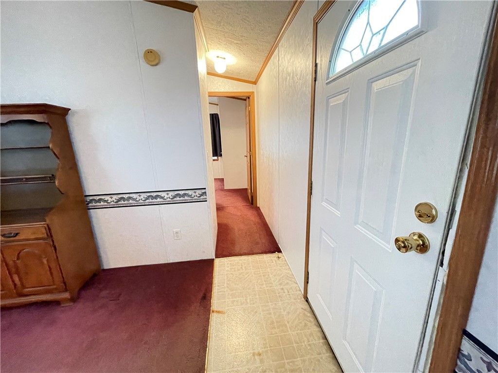 404 Tailrace Lane Mount Morris, NY 14510 - Photo 22 of 31 Living Room (view of hallway leading to bedroom an