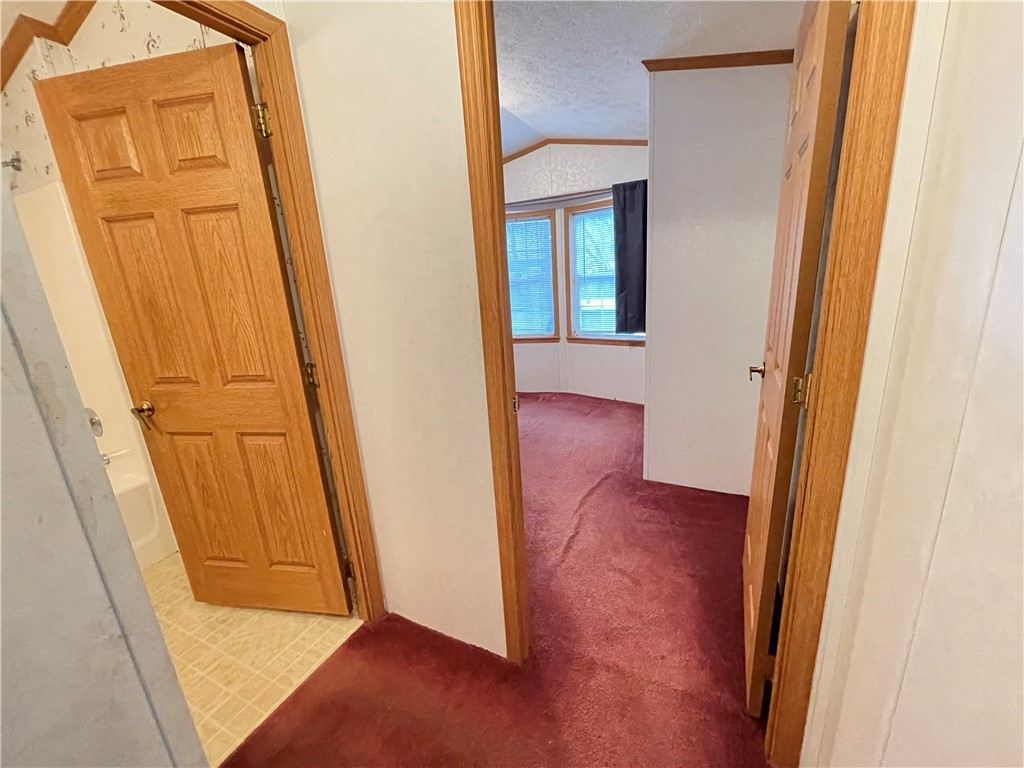 404 Tailrace Lane Mount Morris, NY 14510 - Photo 23 of 31 Hallway view - into bedroom #2 and 2nd full bathro