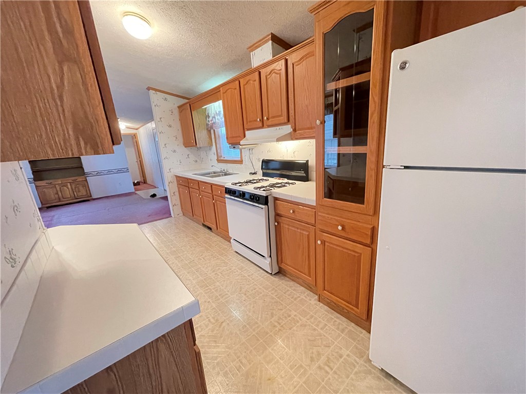 404 Tailrace Lane Mount Morris, NY 14510 - Photo 6 of 31 Kitchen (view from Primary Bedroom).