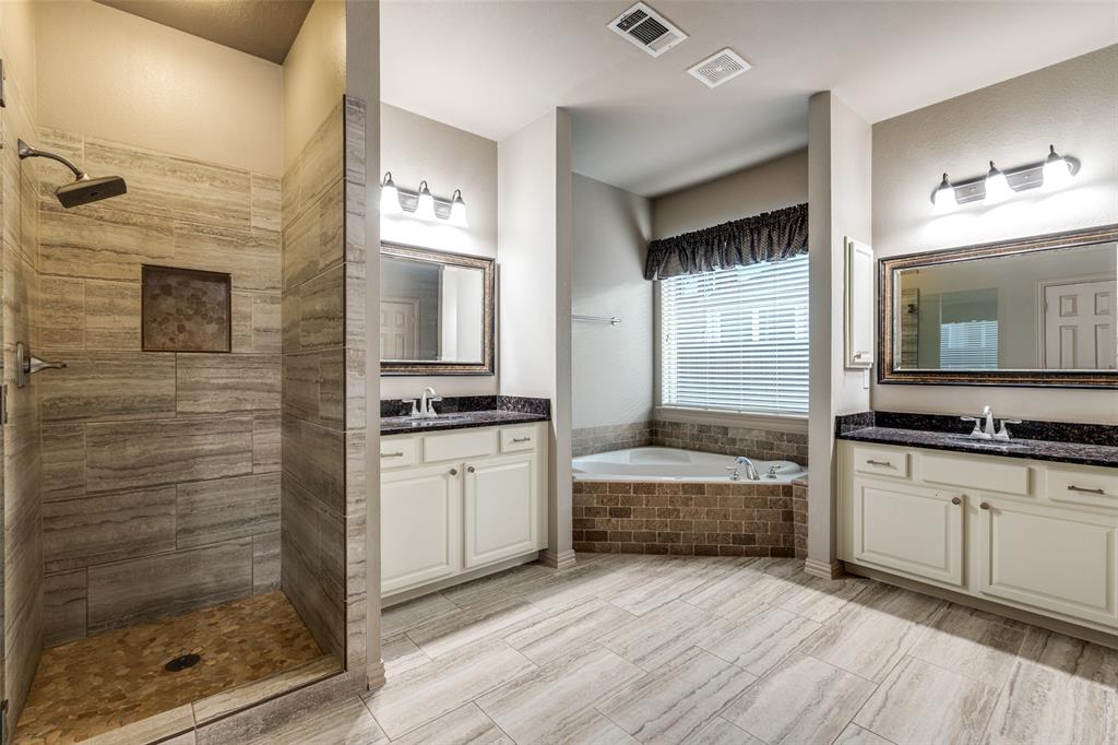 1445 Stagecoach Way Frisco, TX 75033 - Photo 24 of 39 a kitchen with a refrigerator and a sink