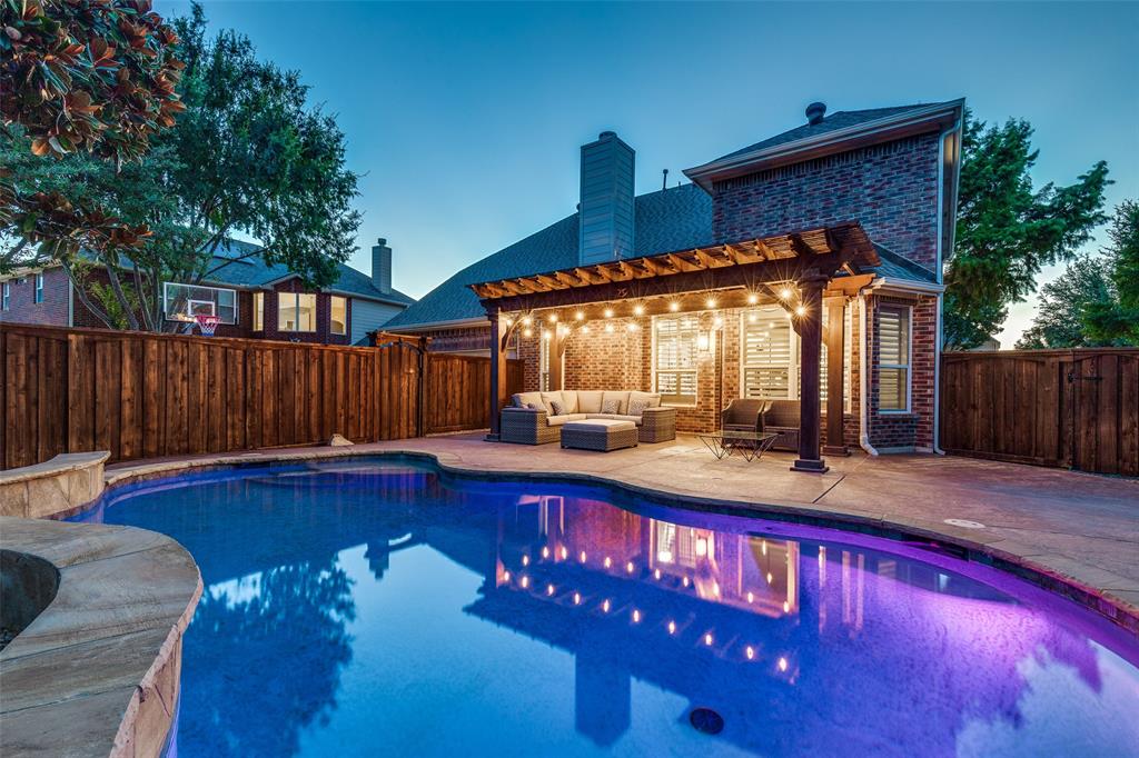 1445 Stagecoach Way Frisco, TX 75033 - Photo 3 of 39 a view of a house with a wooden deck