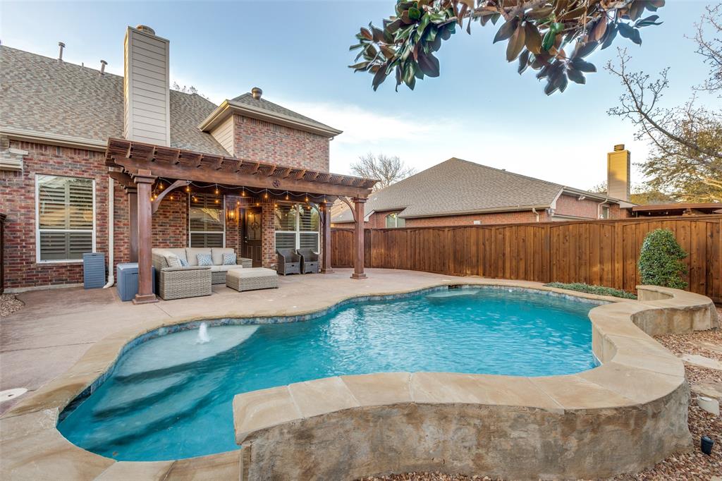 1445 Stagecoach Way Frisco, TX 75033 - Photo 35 of 39 a view of a house with backyard and sitting area