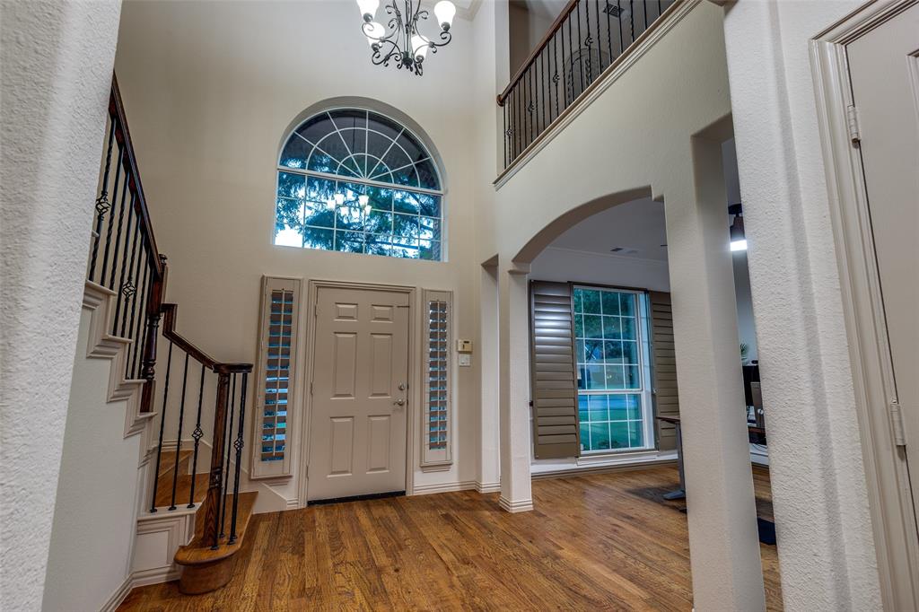 1445 Stagecoach Way Frisco, TX 75033 - Photo 6 of 39 wooden floor in an entryway with an entryway