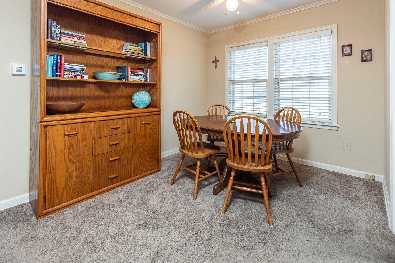 1632 Ivy Road Memphis, TN 38117 - Photo 5 of 14 a dining room with furniture and window