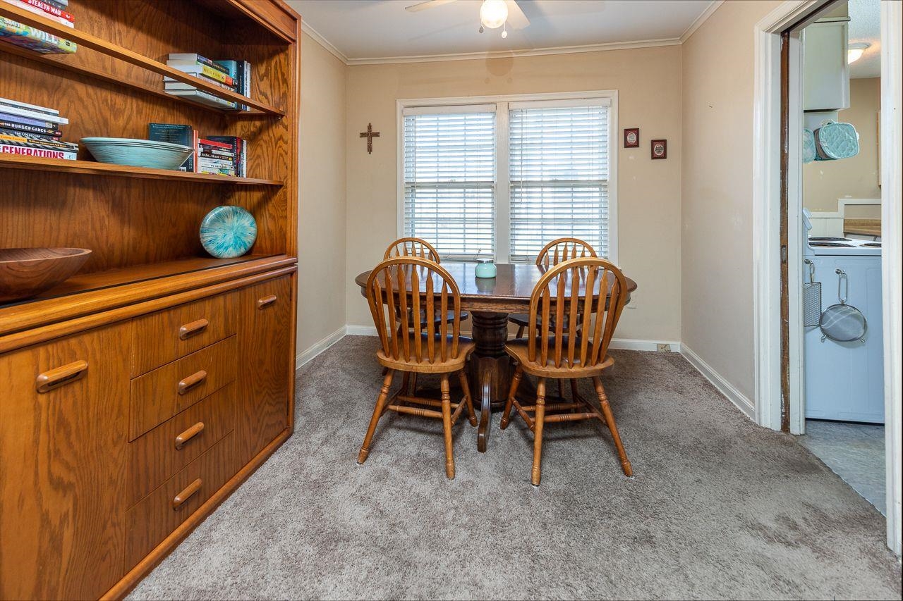 1632 Ivy Road Memphis, TN 38117 - Photo 6 of 14 a dining room with furniture and window