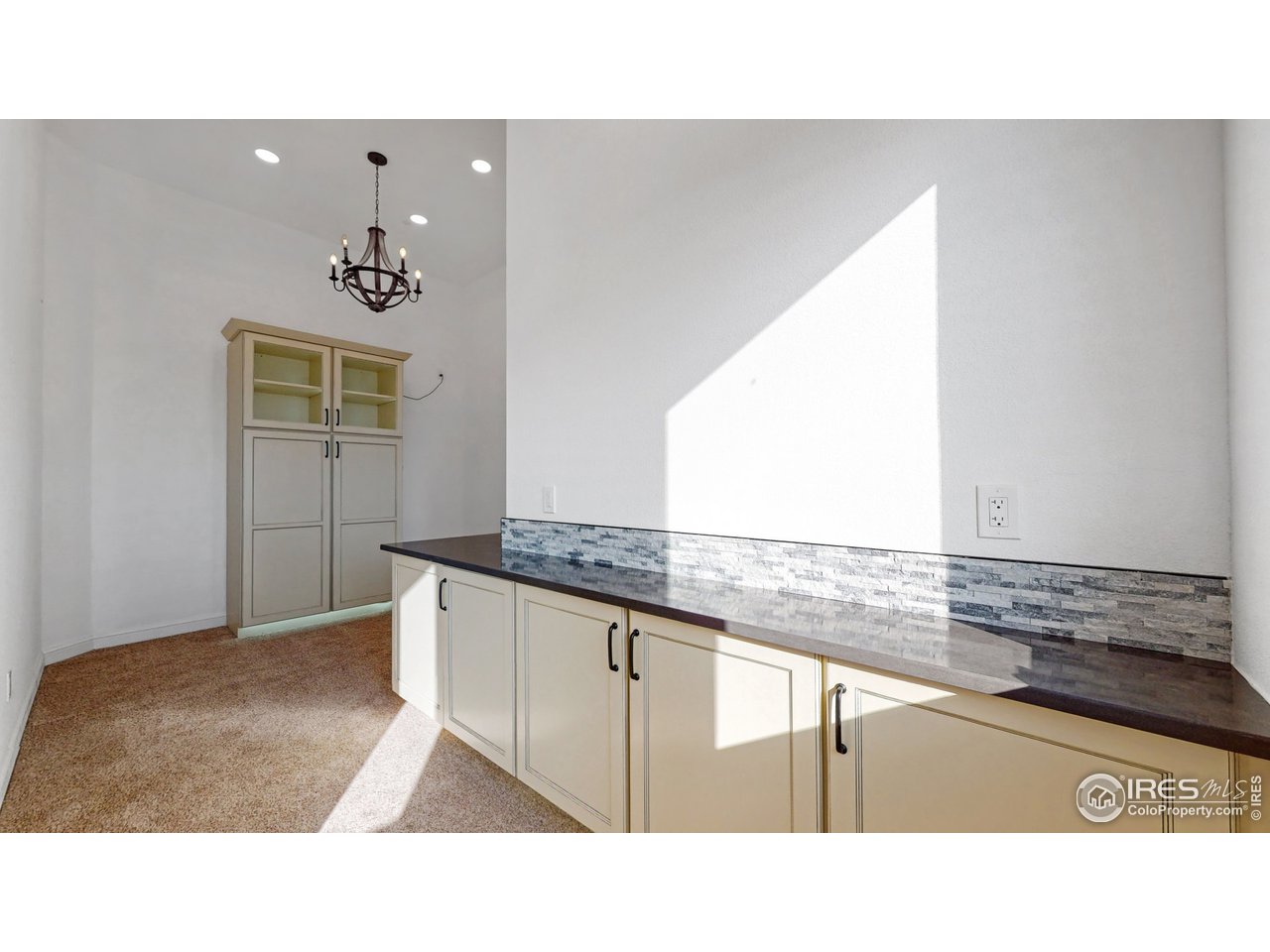 424 Grayhawk Road Fort Collins, CO 80524 - Photo 21 of 40 a kitchen with a sink cabinets and appliances