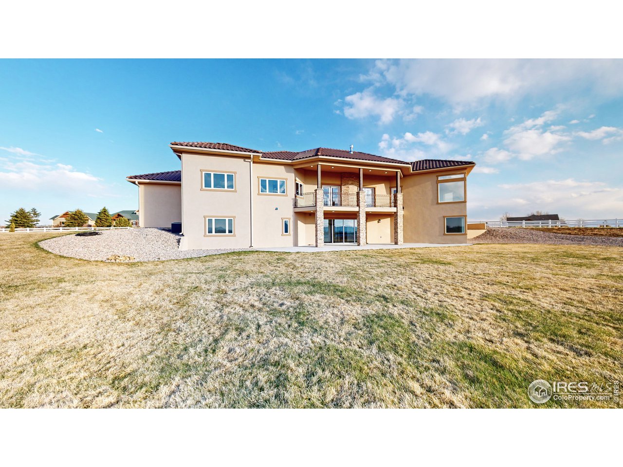 424 Grayhawk Road Fort Collins, CO 80524 - Photo 35 of 40 a view of a house with a outdoor space