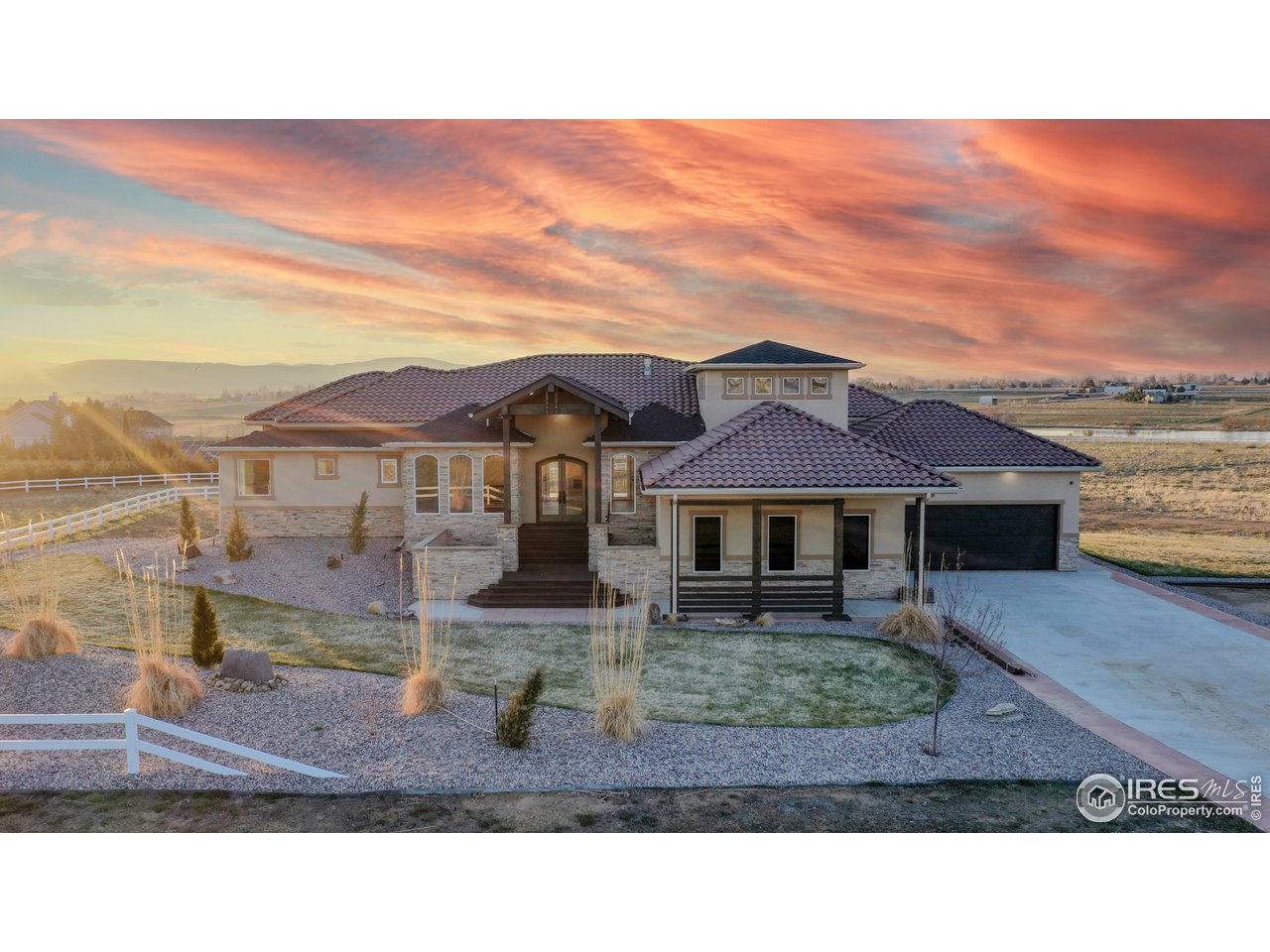 424 Grayhawk Road Fort Collins, CO 80524 - Photo 38 of 40 a house view with a garden