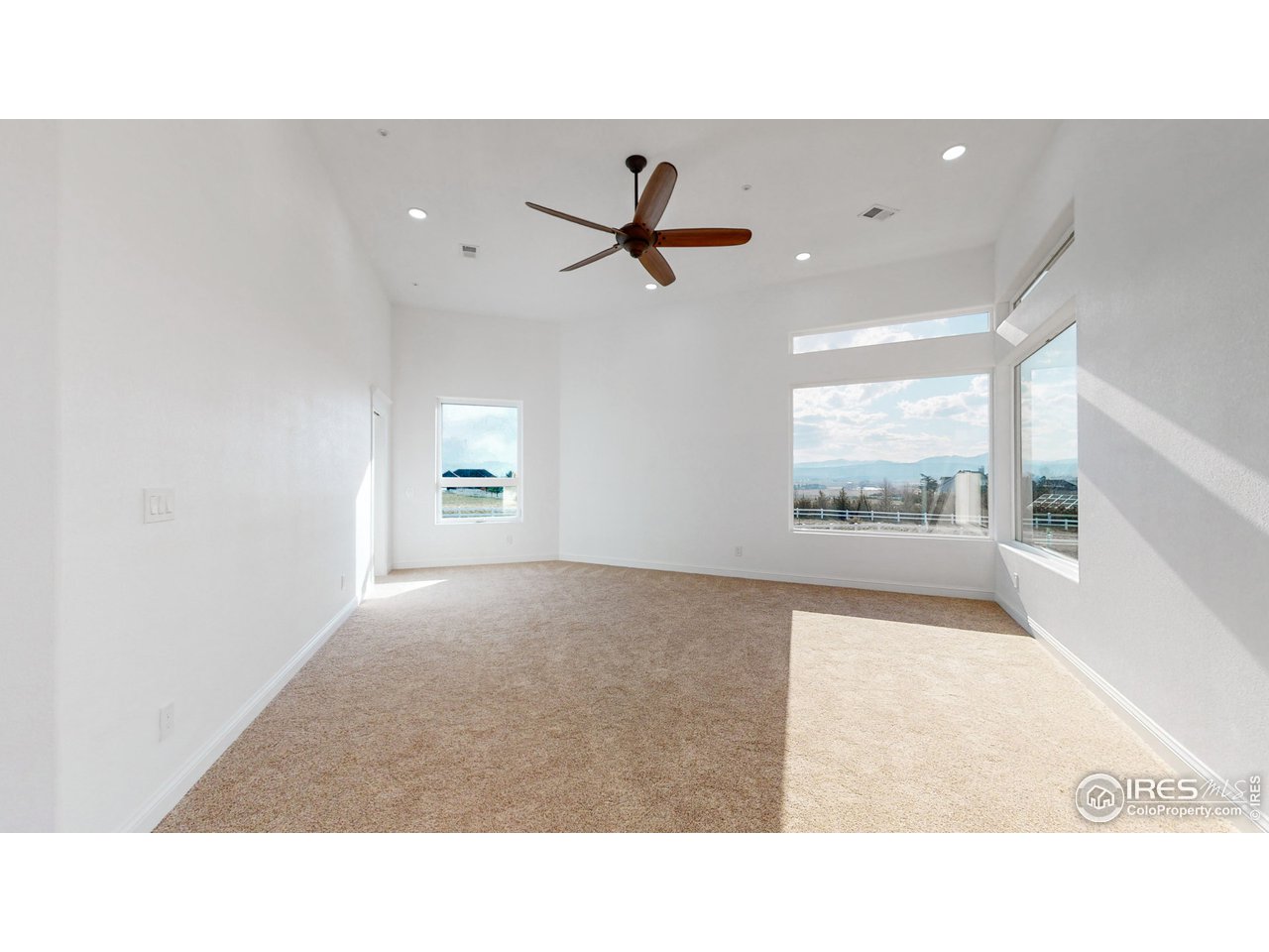 424 Grayhawk Road Fort Collins, CO 80524 - Photo 5 of 40 a open hall with a ceiling fan