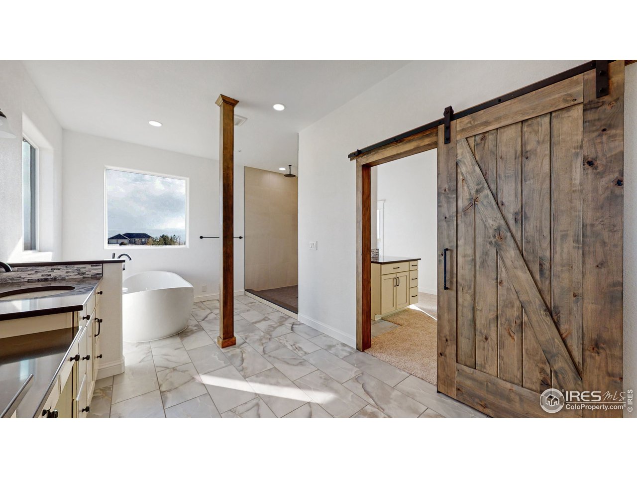 424 Grayhawk Road Fort Collins, CO 80524 - Photo 6 of 40 a bathroom with a sink toilet and shower