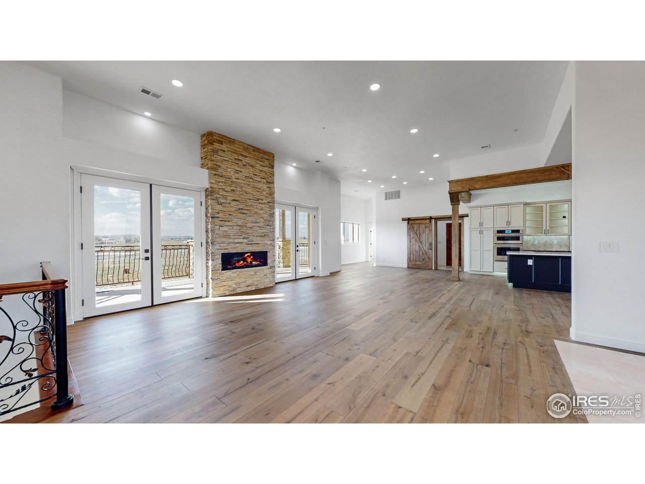 424 Grayhawk Road Fort Collins, CO 80524 - Photo 8 of 40 a upper view of a living room a dining room with furniture and a fireplace