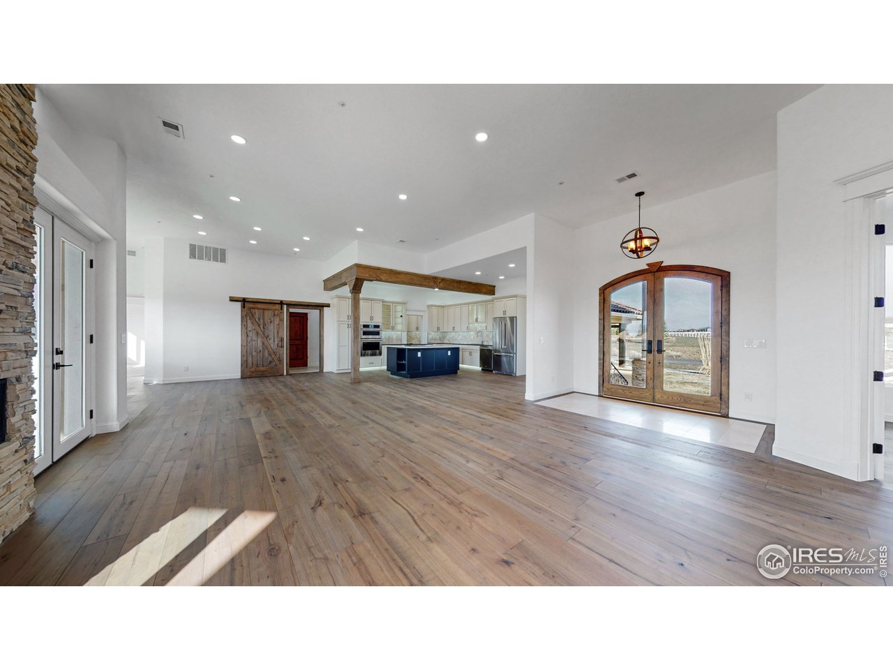 424 Grayhawk Road Fort Collins, CO 80524 - Photo 10 of 40 a living room with furniture and a fireplace