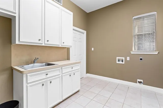 a room with cabinets and window