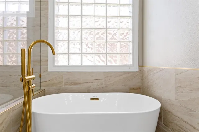 a bathroom with a bathtub