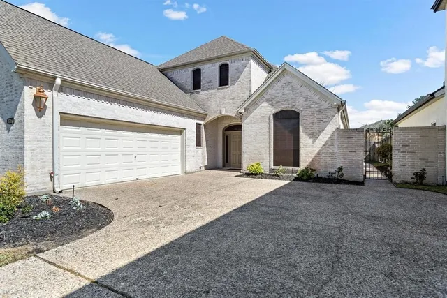 a house view with a backyard space
