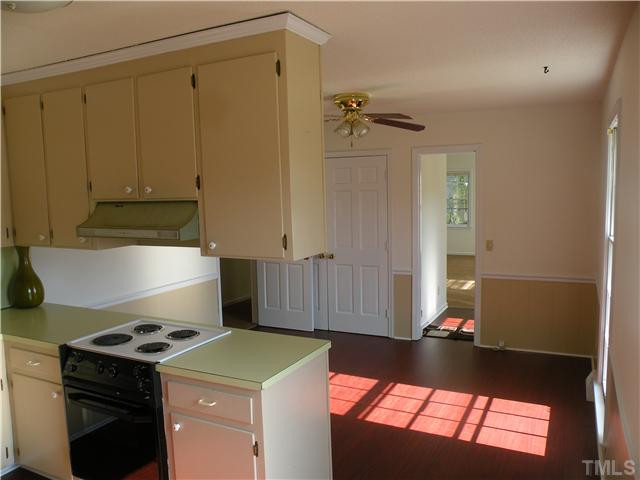 2109 James Slaughter Road Fuquay-Varina, NC 27526 - Photo 6 of 14 Light Bright and Airy Kitchen. Freshly Painted and laminate floors.... Kitchen