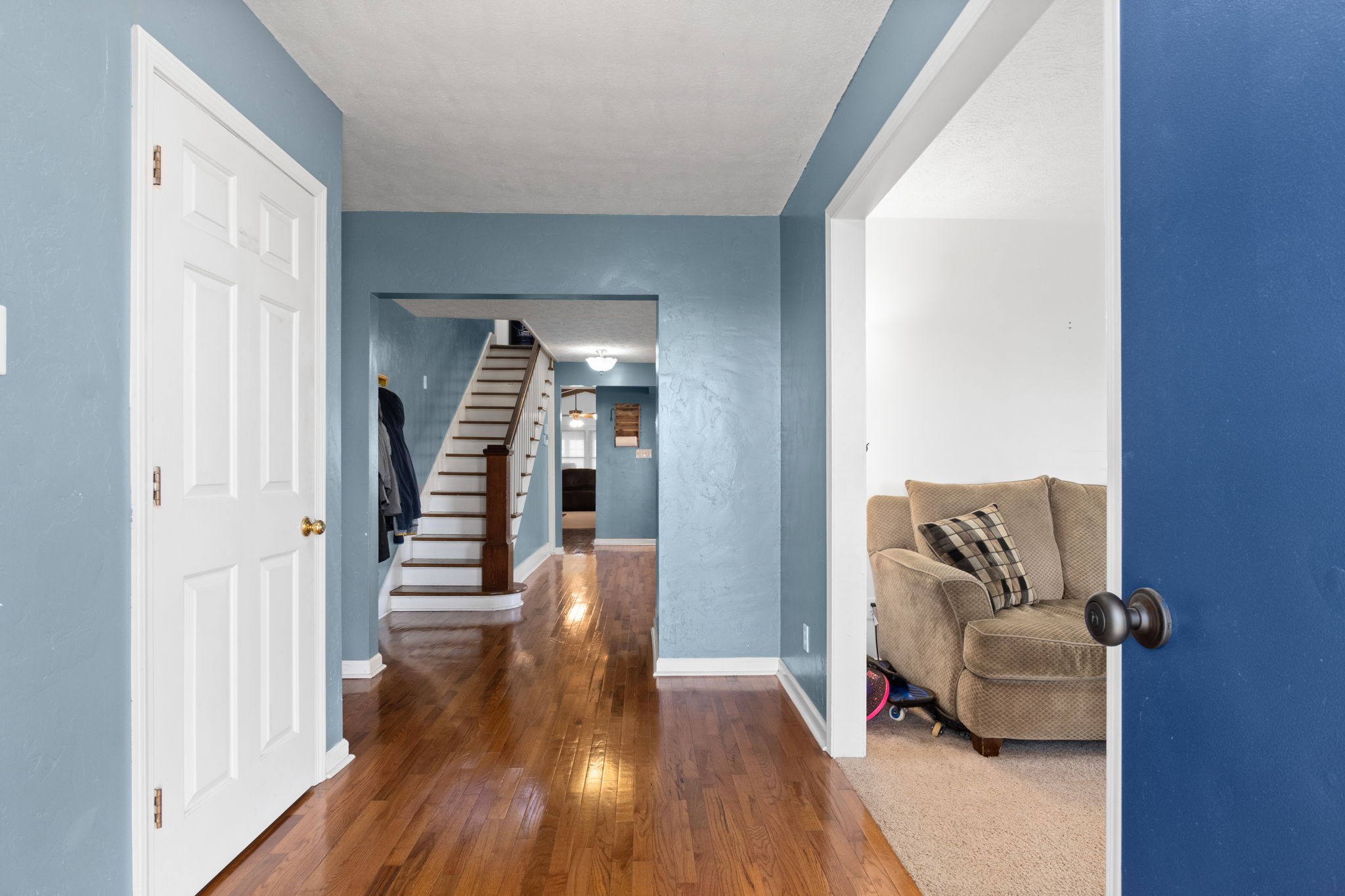 5150 Cadiz Road Hopkinsville, KY 42240 - Photo 5 of 45 a hall way with furniture and wooden floor