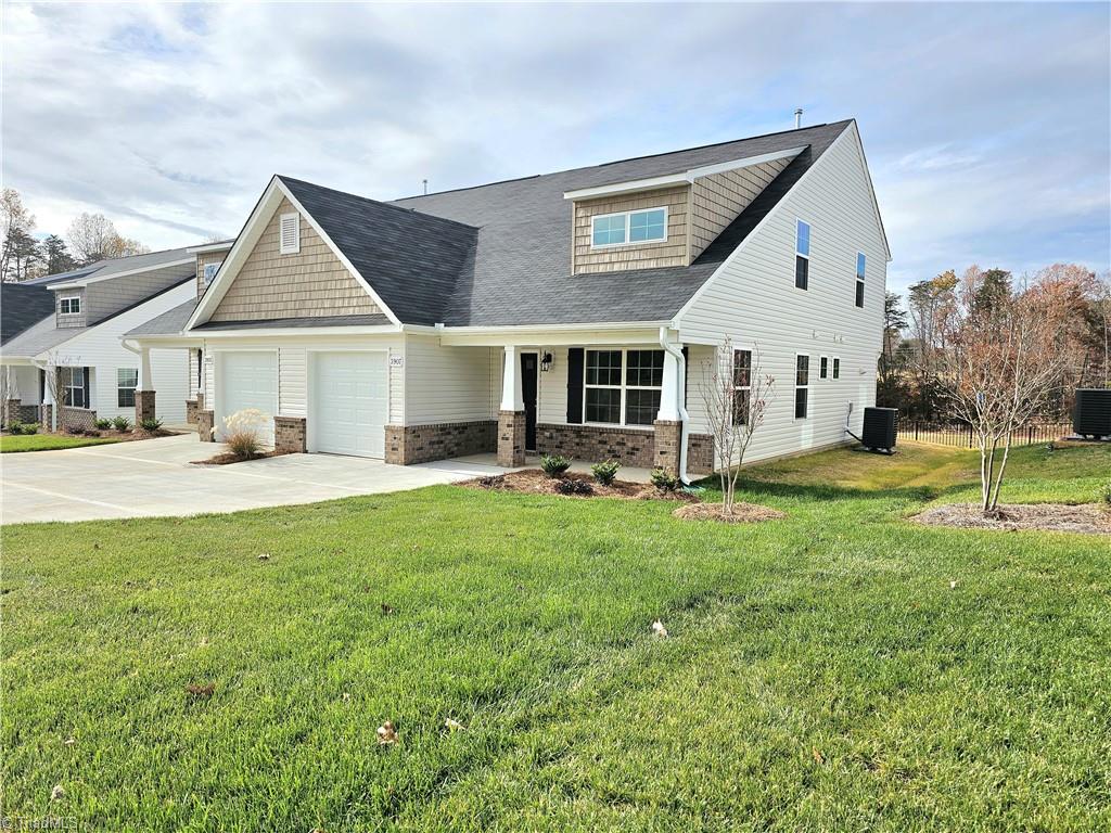 3907 Straw Hat Road Greensboro, NC 27410 - Photo 2 of 26 50 VS - 3907 Straw Hat - Side