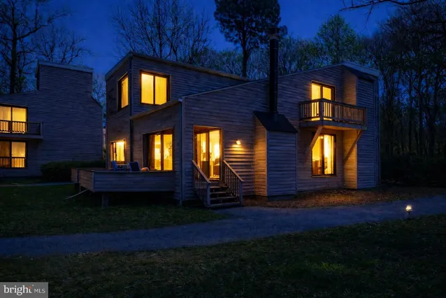 a house view with a swimming pool