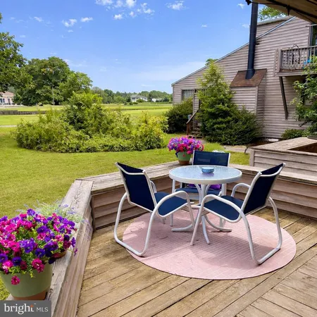 a view of a chairs and table on the terrace