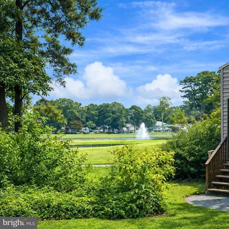 a view of an outdoor space and swimming pool