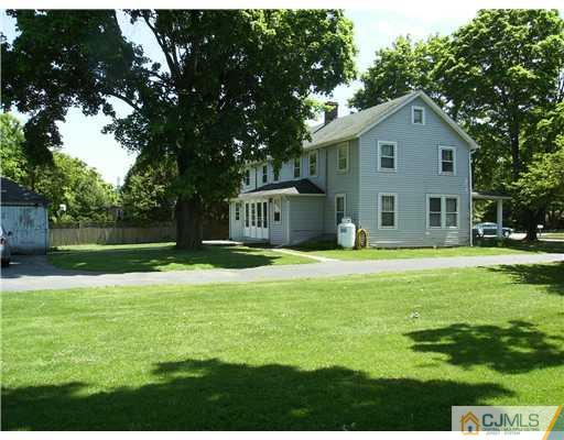 404 Ridge Road Dayton, NJ 08810 - Photo 3 of 3 a house view with swimming pool in front of it