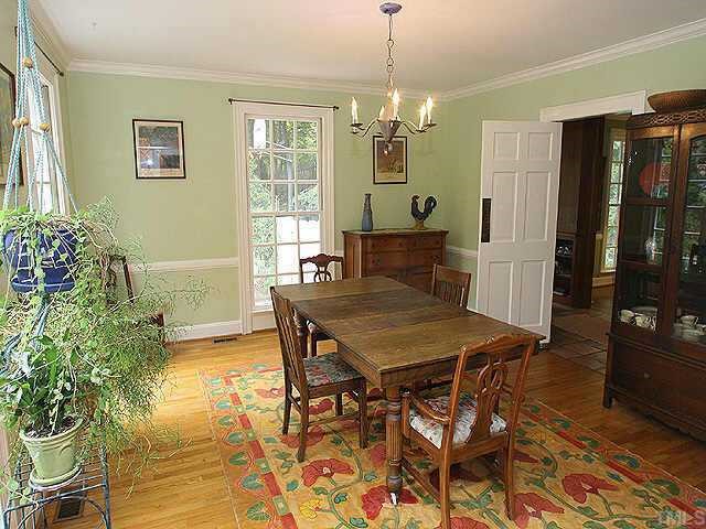 2004 Rangecrest Road Raleigh, NC 27612 - Photo 3 of 10 a view of a dining room with furniture and window