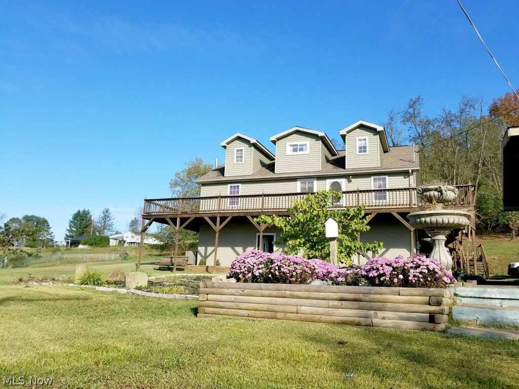 Beautiful Cape style home resting on 1.58 of quiet country acres!