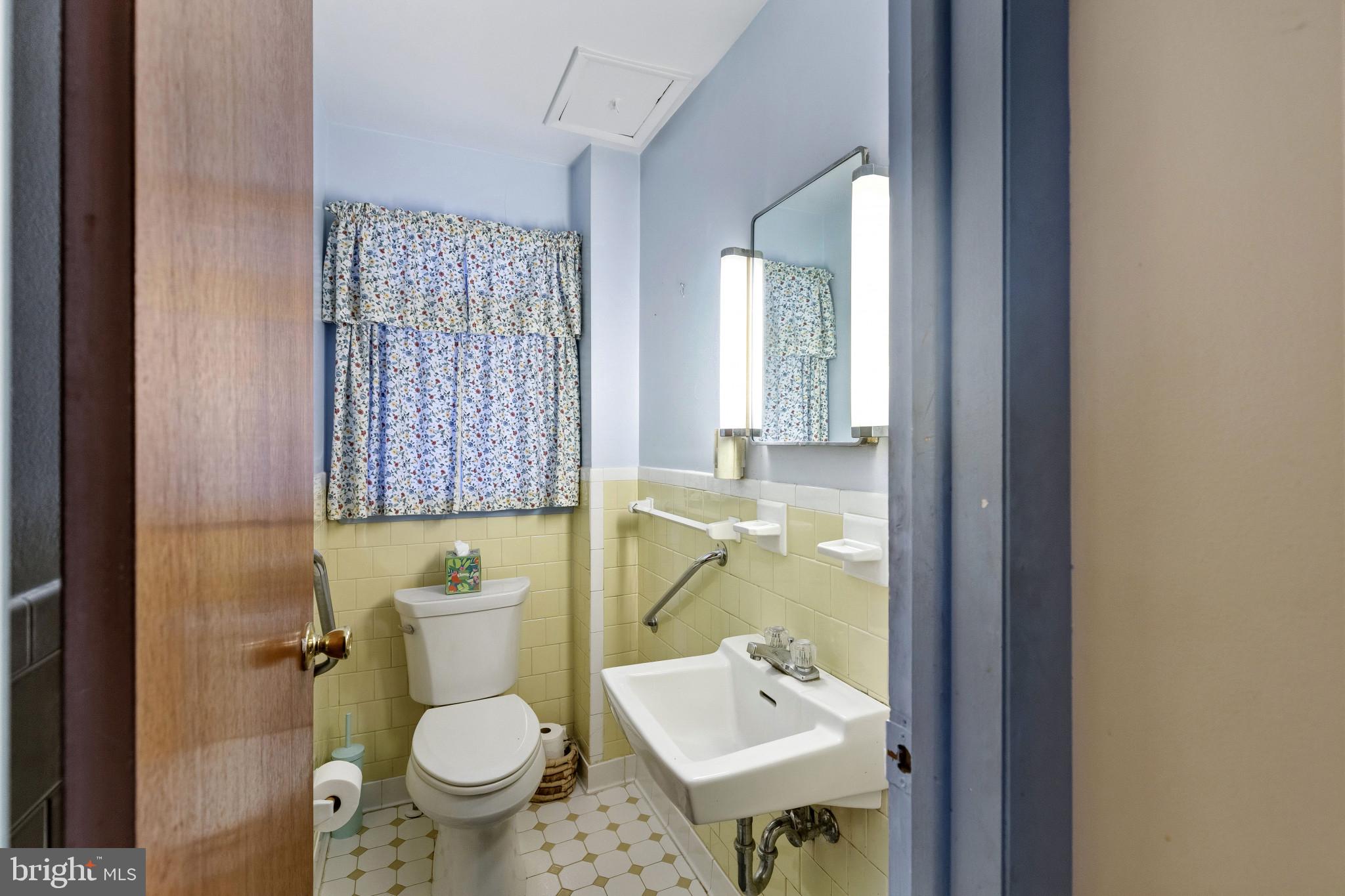 203 Sweetser Road Linthicum Heights, MD 21090 - Photo 14 of 34 Half bathroom on main level