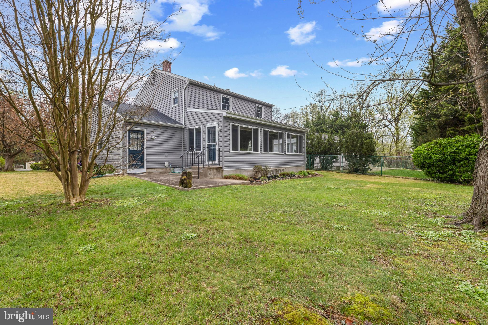 203 Sweetser Road Linthicum Heights, MD 21090 - Photo 29 of 34 Rear view of the home and sun room