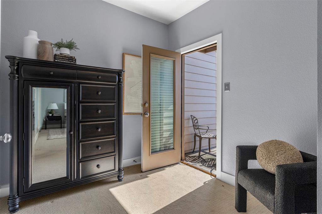 4830 Cedar Springs Road, Unit 30 Dallas, TX 75219 - Photo 14 of 32 a living room with furniture and a closet