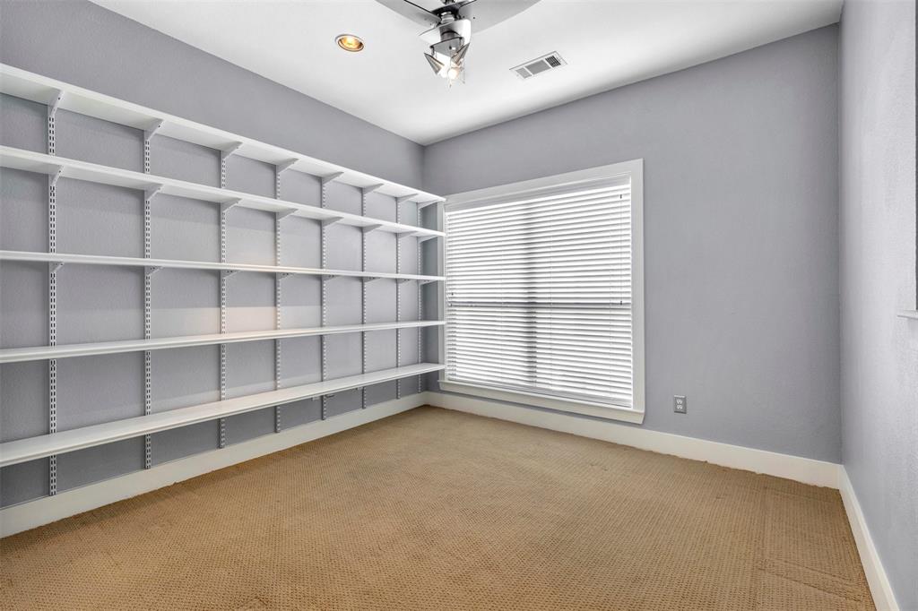 4830 Cedar Springs Road, Unit 30 Dallas, TX 75219 - Photo 19 of 32 a view of an empty room with a window