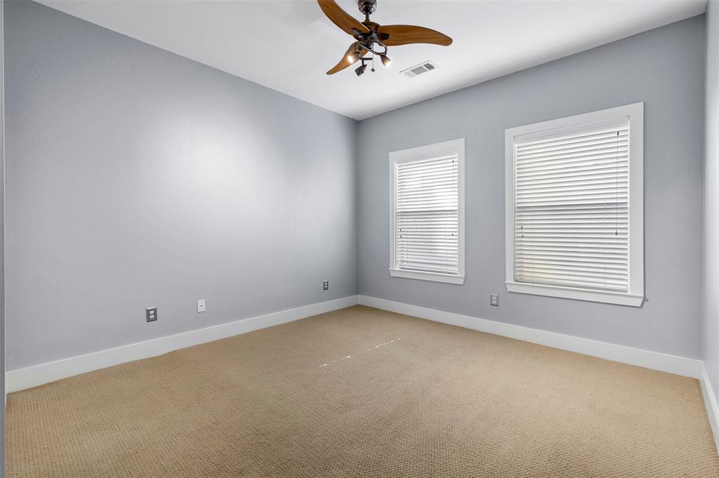 4830 Cedar Springs Road, Unit 30 Dallas, TX 75219 - Photo 20 of 32 an empty room with a window