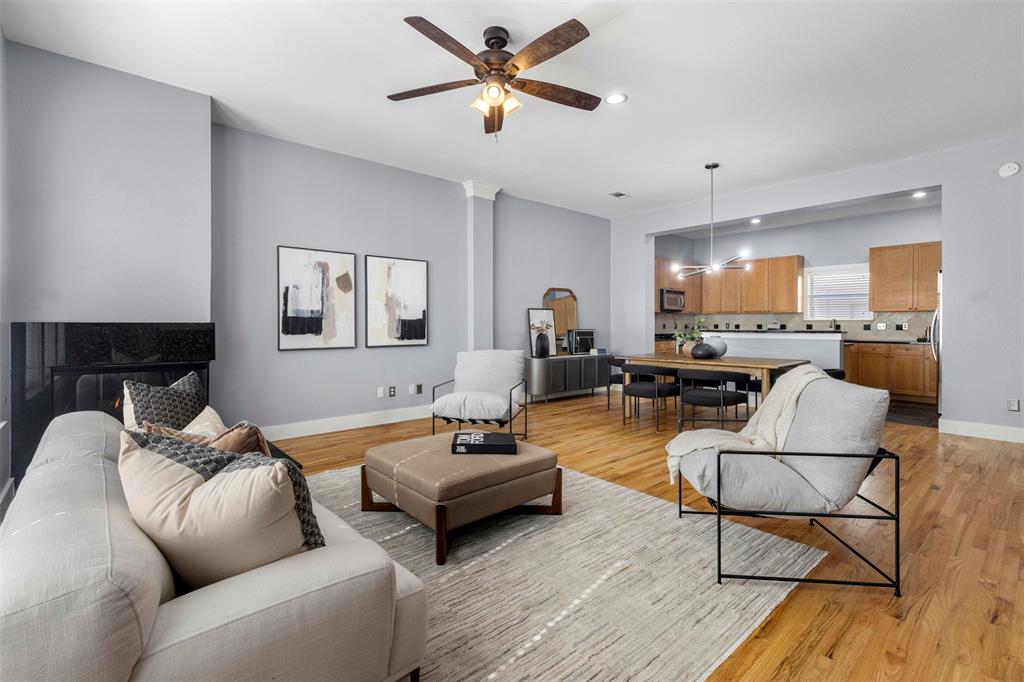4830 Cedar Springs Road, Unit 30 Dallas, TX 75219 - Photo 2 of 32 a living room with furniture and kitchen view