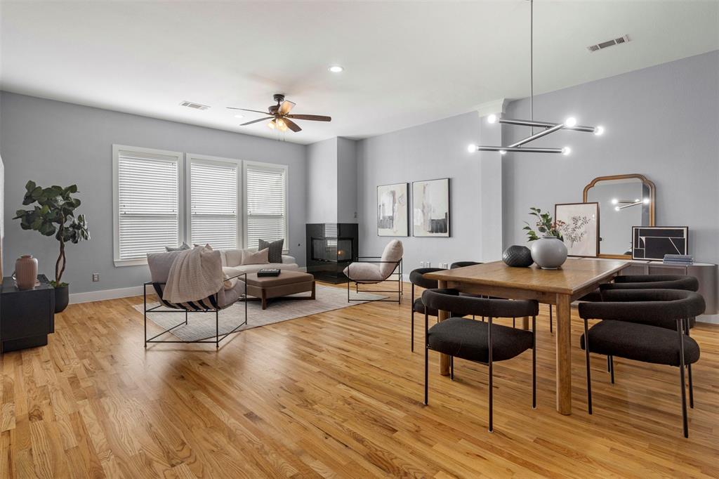 4830 Cedar Springs Road, Unit 30 Dallas, TX 75219 - Photo 4 of 32 a living room with furniture and a large window