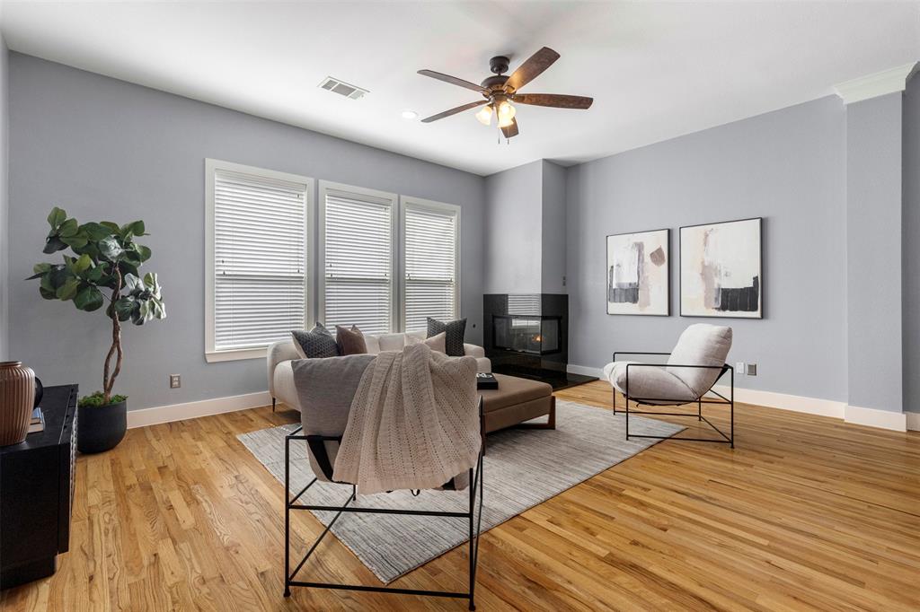 4830 Cedar Springs Road, Unit 30 Dallas, TX 75219 - Photo 5 of 32 a living room with furniture and a large window