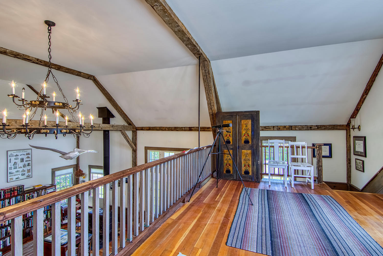 459 Sunset Road Deer Isle, ME 04627 - Photo 22 of 47 Great room loft and chandelier
