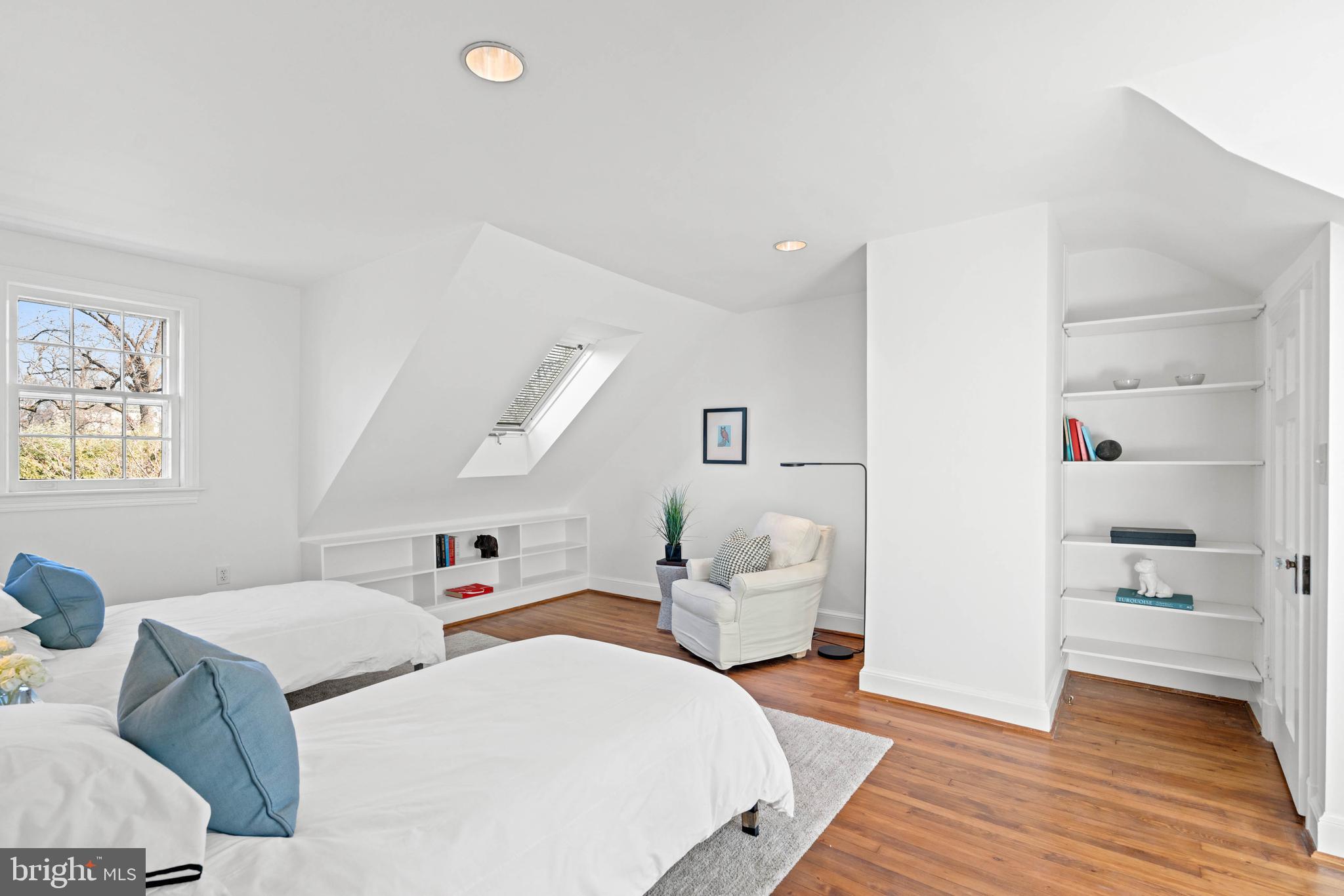 3549 Springland Lane Northwest Washington, DC 20008 - Photo 29 of 47 a bedroom with a bed and wooden floor