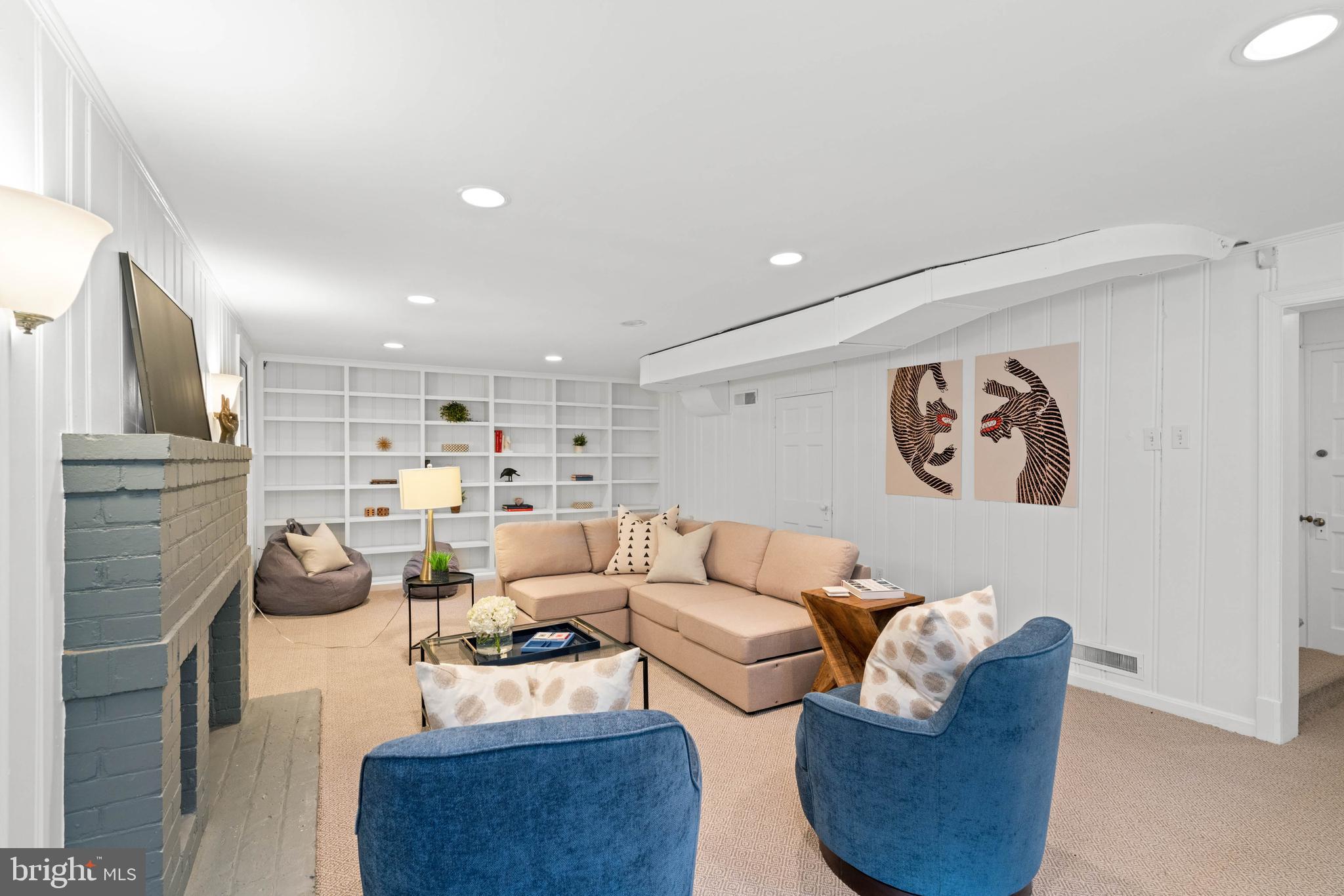 3549 Springland Lane Northwest Washington, DC 20008 - Photo 32 of 47 a living room with furniture and a fireplace