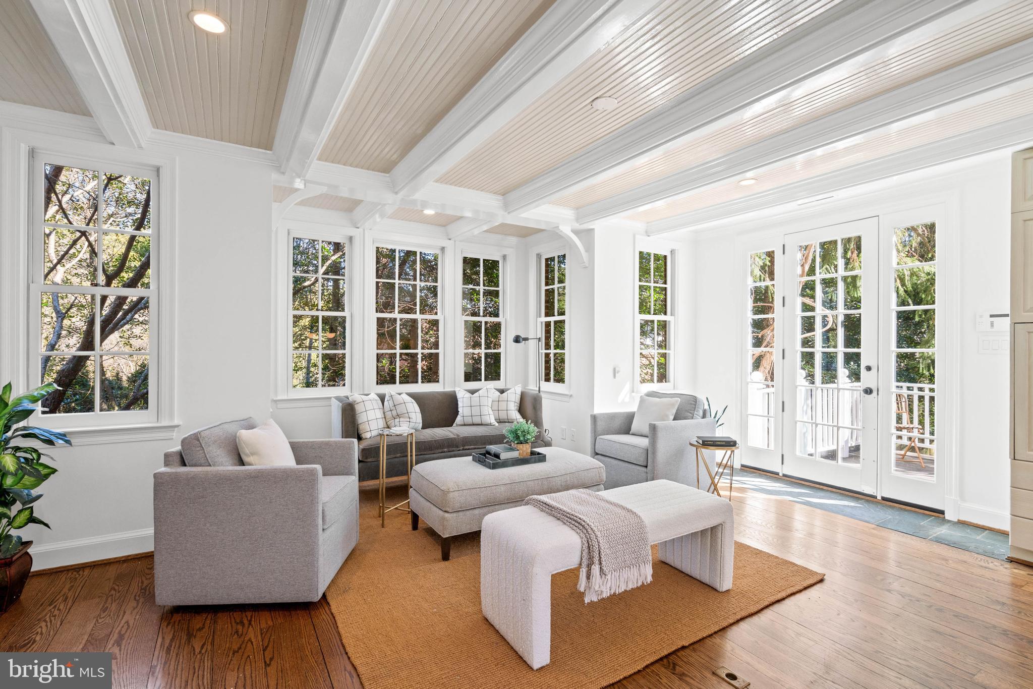 3549 Springland Lane Northwest Washington, DC 20008 - Photo 10 of 47 a living room with furniture and large windows