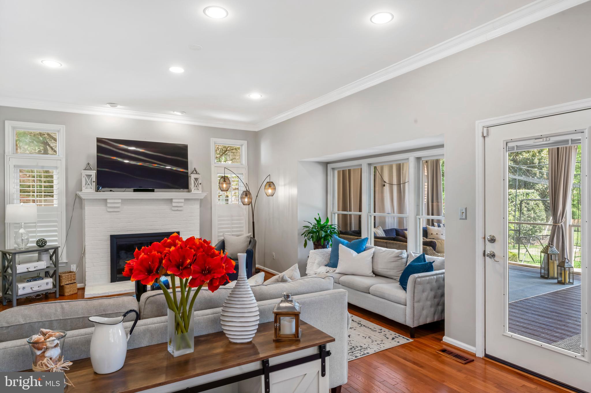 2519 Fallon Drive Herndon, VA 20171 - Photo 20 of 107 a living room with furniture and a flat screen tv